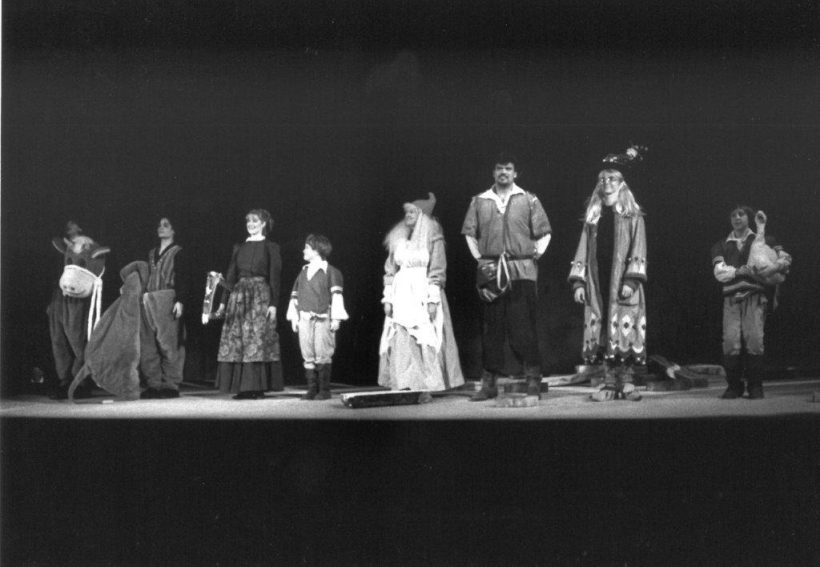 actors standing in line on stage