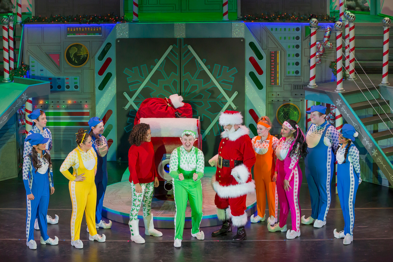 Santa and elves on stage